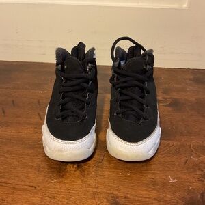 size 12C Air Jordan 9 “Flight” sneakers.